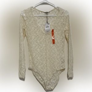 Cream colored lace body shirt